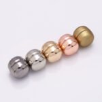 Close-up of magnetic brooches for hijab